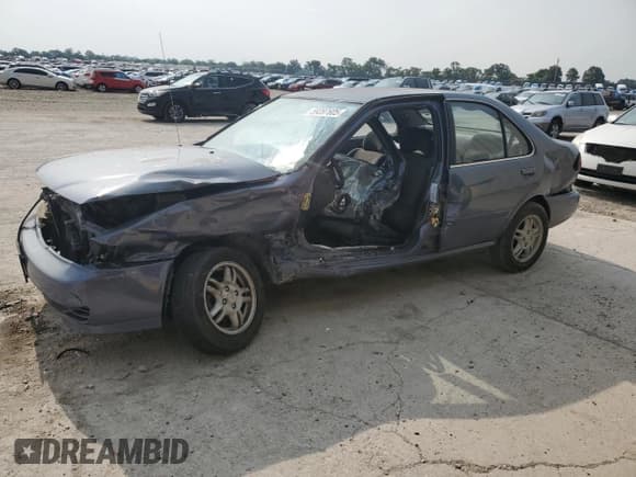 ✅ 1999 Nissan Sentra XE • VIN: 1N4AB41D0XC731615 • Lot: 59397605. Listed on Copart with 78,486 mi. Free auction sales archive from the USA and detailed vehicle history report at DreamBid. Image 1.