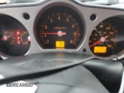 ✅ 2004 Nissan 350Z Touring • VIN: JN1AZ34E94M155889 • Лот: 50212745. Опубликован ранее на Copart с пробегом 174 451 миль. Бесплатный доступ к архиву аукционных продаж из США и подробный отчёт об истории автомобиля на DreamBid. Изображение 9.