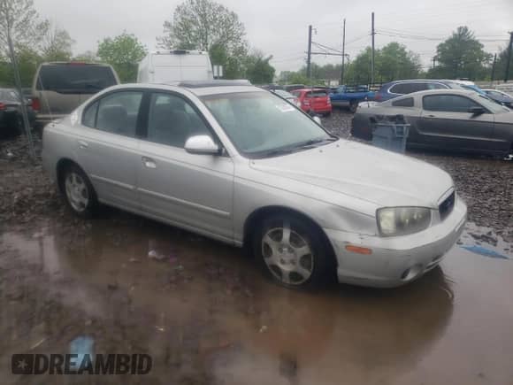 2003 Hyundai Elantra GLS z VIN KMHDN45D23U505391, wystawiony jako Copart lot #52038974 z przebiegiem 85 562 mil mil oraz Czysty tytuł • Clean title. Historia ofert i sprzedaży dostępna na DreamBid. Obrazek 4.