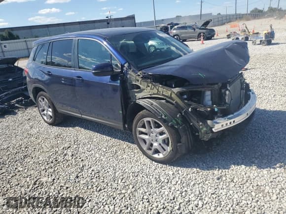 ✅ 2025 Honda Passport EX-L • VIN: 5FNYF8H54SB005464 • Лот: 70589395. Опубликован ранее на Copart с пробегом 6 992 миль. Бесплатный доступ к архиву аукционных продаж из США и подробный отчёт об истории автомобиля на DreamBid. Изображение 4.