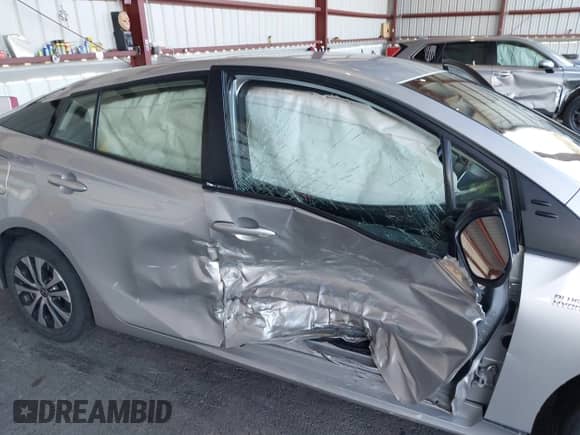 2021 Toyota Prius Limited z VIN JTDKAMFP9M3187986, wystawiony jako IAAI lot #43398563 z przebiegiem 38 772 mil mil oraz . Historia ofert i sprzedaży dostępna na DreamBid. Obrazek 6.