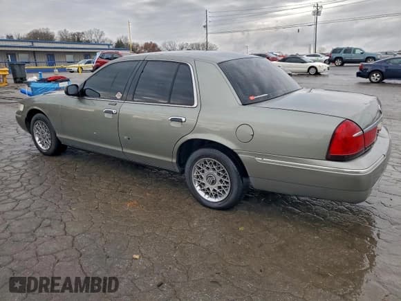 ✅ 1998 Mercury Grand Marquis GS • VIN: 2MEFM74W8WX653299 • Lot: 92753585. Wystawiony na Copart z przebiegiem 129 393 mil. Bezpłatny archiwum sprzedaży aukcyjnych z USA i szczegółowy raport historii pojazdu na DreamBid. Zdjęcie 2.