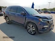 ✅ 2018 Honda Pilot Touring • VIN: 5FNYF5H94JB006212 • Lot: 70333075. Listed on Copart with 130,677 mi. Free auction sales archive from the USA and detailed vehicle history report at DreamBid. Image 4.