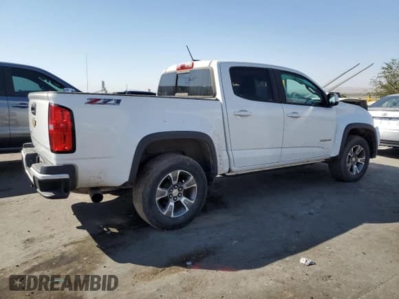 ✅ 2016 Chevrolet Colorado 4WD Z71 • VIN: 1GCGTDE30G1358400 • Лот: 74707354. Опубликован ранее на Copart с пробегом 128 966 миль. Бесплатный доступ к архиву аукционных продаж из США и подробный отчёт об истории автомобиля на DreamBid. Изображение 3.