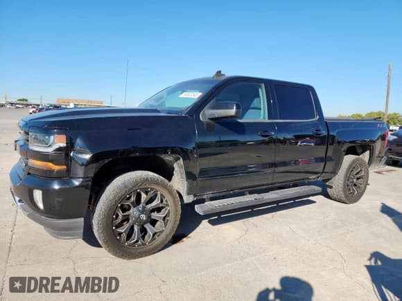 ✅ 2018 Chevrolet Silverado 1500 LT • VIN: 3GCUKREC5JG164974 • Лот: 90520345. Опубликован ранее на Copart с пробегом 171 279 миль. Бесплатный доступ к архиву аукционных продаж из США и подробный отчёт об истории автомобиля на DreamBid. Изображение 1.