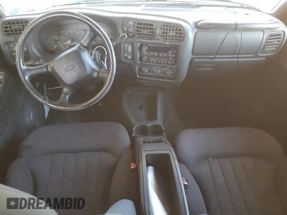 2003 Chevrolet Blazer LS z VIN 1GNDT13X63K170628, wystawiony jako Copart lot #77502884 z przebiegiem Nie podano mil oraz Czysty tytuł • Clean title. Historia ofert i sprzedaży dostępna na DreamBid. Obrazek 8.