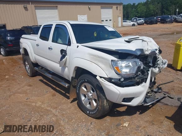 ✅ 2015 Toyota Tacoma PreRunner • VIN: 5TFKU4HN3FX007156 • Lot: 42460345. Listed on IAAI with 123,563 mi. Free auction sales archive from the USA and detailed vehicle history report at DreamBid. Image 1.