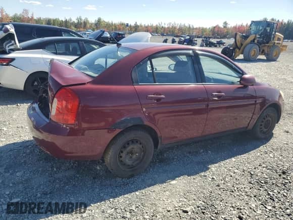 2006 Hyundai Accent GL z VIN KMHCN45C26U052459, wystawiony jako Copart lot #84417075 z przebiegiem 247 312 mil mil oraz Szkoda całkowita • Salvage title. Historia ofert i sprzedaży dostępna na DreamBid. Obrazek 3.