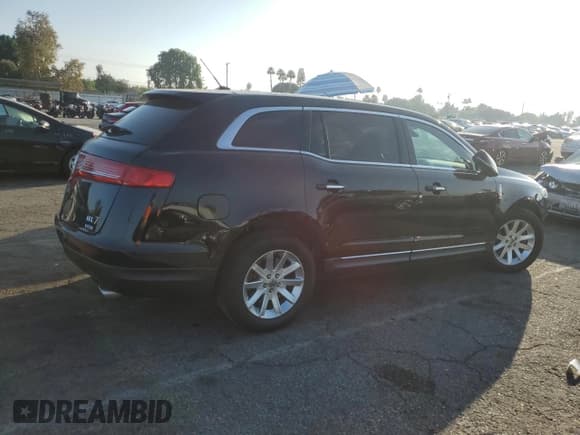 ✅ 2017 Lincoln MKT • VIN: 2LMHJ5NK3HBL00097 • Lot: 90131695. Listed on Copart with 154,010 mi. Free auction sales archive from the USA and detailed vehicle history report at DreamBid. Image 3.
