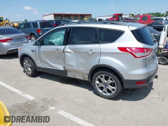 ✅ 2013 Ford Escape SEL • VIN: 1FMCU0H97DUC70437 • Lot: 42372921. Wystawiony na IAAI z przebiegiem 193 069 mil. Bezpłatny archiwum sprzedaży aukcyjnych z USA i szczegółowy raport historii pojazdu na DreamBid. Zdjęcie 3.