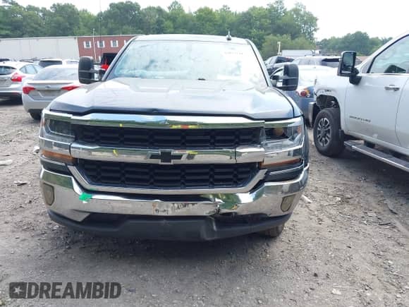 2018 Chevrolet Silverado 1500 LT z VIN 1GCRCREH9JZ111046, wystawiony jako IAAI lot #42837741 z przebiegiem 82 591 mil mil oraz . Historia ofert i sprzedaży dostępna na DreamBid. Obrazek 6.