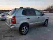 2005 Hyundai Tucson GL z VIN KM8JM12B65U078288, wystawiony jako Copart lot #85328574 z przebiegiem 91 117 mil mil oraz Czysty tytuł • Clean title. Historia ofert i sprzedaży dostępna na DreamBid. Obrazek 3.