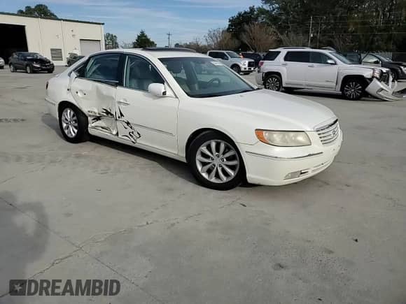 2006 Hyundai Azera SE с VIN KMHFC46F66A128343, выставлен на аукционе Copart как лот 83447424 с пробегом 274 218 миль миль и Списание • Salvage title. История ставок и продаж доступна на DreamBid. Изображение 11.