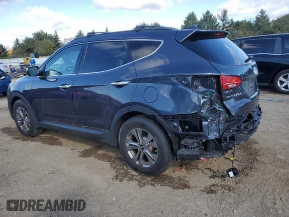 ✅ 2015 Hyundai Santa Fe • VIN: 5XYZU3LBXFG264162 • Lot: 89681285. Listed on Copart with 96,828 mi. Free auction sales archive from the USA and detailed vehicle history report at DreamBid. Image 2.