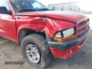 ✅ 2001 Dodge Dakota Sport • VIN: 1B7GG2AN01S105143 • Lot: 41615969. Wystawiony na IAAI z przebiegiem 211 884 mil. Bezpłatny archiwum sprzedaży aukcyjnych z USA i szczegółowy raport historii pojazdu na DreamBid. Zdjęcie 6.