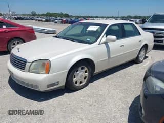 ✅ 2002 Cadillac DeVille • VIN: 1G6KD54Y52U251010 • Lot: 42817879. Listed on IAAI with 100,397 mi. Free auction sales archive from the USA and detailed vehicle history report at DreamBid. Image 2.