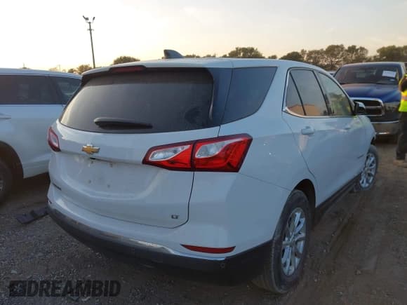 ✅ 2020 Chevrolet Equinox LT • VIN: 2GNAXJEV0L6164006 • Lot: 43519260. Listed on IAAI with 60,174 mi. Free auction sales archive from the USA and detailed vehicle history report at DreamBid. Image 4.