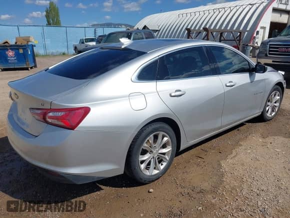 2019 Chevrolet Malibu LT with VIN 1G1ZD5ST8KF147594, listed as a IAAI auction lot 42182397 with 163,177 mi miles and . Bid and sale history available at DreamBid. Image 4.