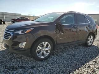 ✅ 2020 Chevrolet Equinox Premier • VIN: 2GNAXNEV9L6259204 • Lot: 89876985. Wystawiony na Copart z przebiegiem 34 709 mil. Bezpłatny archiwum sprzedaży aukcyjnych z USA i szczegółowy raport historii pojazdu na DreamBid. Zdjęcie 1.