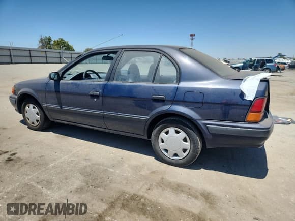 ✅ 1995 Toyota Tercel DX • VIN: JT2EL56E4S7035348 • Lot: 64114335. Listed on Copart with 184,352 mi. Free auction sales archive from the USA and detailed vehicle history report at DreamBid. Image 2.