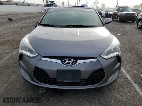 2016 Hyundai Veloster z VIN KMHTC6AD9GU260582, wystawiony jako Copart lot #71878294 z przebiegiem 83 155 mil mil oraz Szkoda całkowita • Salvage title. Historia ofert i sprzedaży dostępna na DreamBid. Obrazek 5.