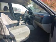 ✅ 1999 Jeep Grand Cherokee Laredo • VIN: 1J4GW58SXXC665247 • Лот: 43728247. Опубликован ранее на IAAI с пробегом 257 452 миль. Бесплатный доступ к архиву аукционных продаж из США и подробный отчёт об истории автомобиля на DreamBid. Изображение 5.