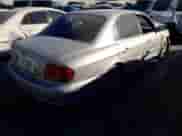 2003 Hyundai Sonata z VIN KMHWF25H93A810837, wystawiony jako Copart lot #87338264 z przebiegiem 73 916 mil mil oraz Nie do naprawy • Non repairable. Historia ofert i sprzedaży dostępna na DreamBid. Obrazek 3.