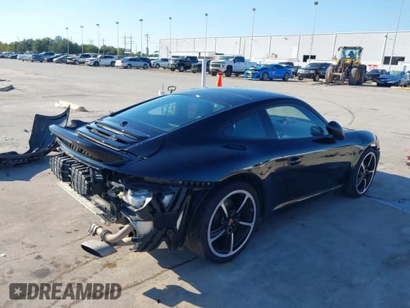 ✅ 2016 Porsche 911 Carrera • VIN: WP0AA2A92GS106538 • Lot: 43427299. Listed on IAAI with 41,863 mi. Free auction sales archive from the USA and detailed vehicle history report at DreamBid. Image 4.