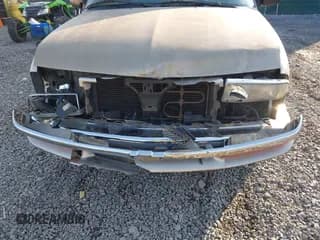 ✅ 2001 Chevrolet Blazer LT • VIN: 1GNDT13W212167763 • Lot: 41997079. Wystawiony na IAAI z przebiegiem 173 050 mil. Bezpłatny archiwum sprzedaży aukcyjnych z USA i szczegółowy raport historii pojazdu na DreamBid. Zdjęcie 6.