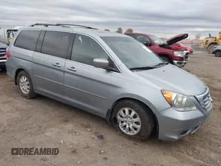 ✅ 2010 Honda Odyssey EX-L • VIN: 5FNRL3H73AB064246 • Lot: 43706303. Listed on IAAI with 174,127 mi. Free auction sales archive from the USA and detailed vehicle history report at DreamBid. Image 1.