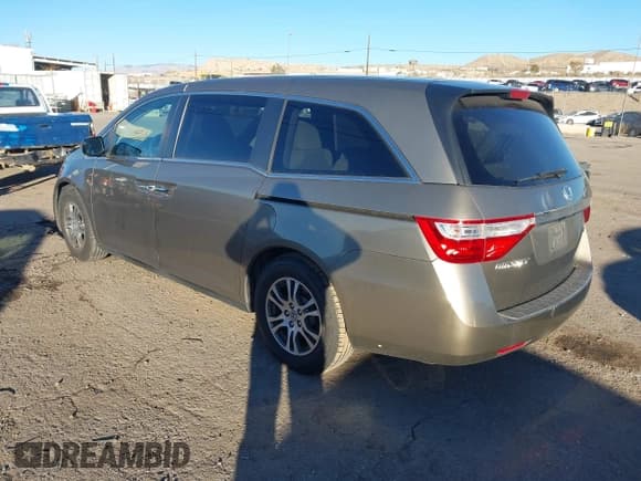 ✅ 2013 Honda Odyssey EX • VIN: 5FNRL5H49DB024582 • Lot: 43875807. Listed on IAAI with 111,799 mi. Free auction sales archive from the USA and detailed vehicle history report at DreamBid. Image 3.