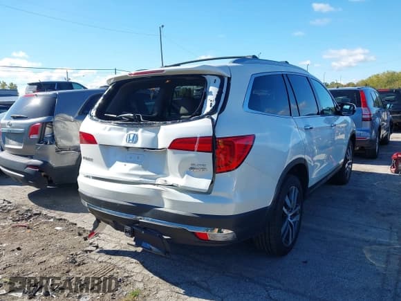 ✅ 2018 Honda Pilot Elite • VIN: 5FNYF6H06JB024508 • Лот: 43426165. Опубликован ранее на IAAI с пробегом 100 887 миль. Бесплатный доступ к архиву аукционных продаж из США и подробный отчёт об истории автомобиля на DreamBid. Изображение 4.