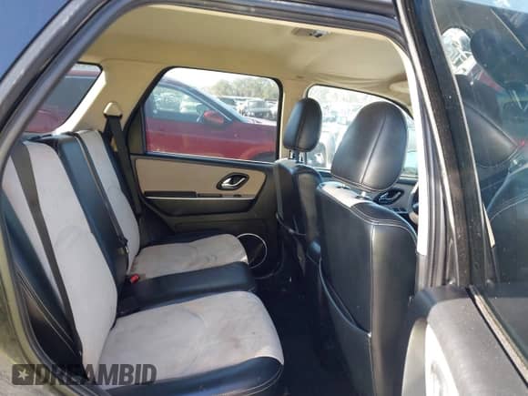 2007 Mercury Mariner Premier с VIN 4M2CU97127KJ20444, выставлен на аукционе IAAI как лот 40810464 с пробегом 163 702 миль миль и . История ставок и продаж доступна на DreamBid. Изображение 8.