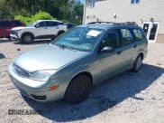 ✅ 2005 Ford Focus SE • VIN: 1FAFP36N25W293100 • Лот: 42993386. Опубликован ранее на IAAI с пробегом 77 178 миль. Бесплатный доступ к архиву аукционных продаж из США и подробный отчёт об истории автомобиля на DreamBid. Изображение 2.