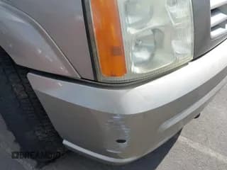 ✅ 2003 Cadillac Escalade • VIN: 1GYEC63T33R278259 • Lot: 43611203. Wystawiony na IAAI z przebiegiem 294 061 mil. Bezpłatny archiwum sprzedaży aukcyjnych z USA i szczegółowy raport historii pojazdu na DreamBid. Zdjęcie 6.