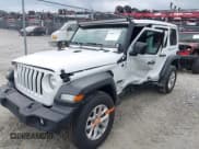 ✅ 2023 Jeep Wrangler Willys • VIN: 1C4HJXDG9PW545749 • Lot: 42307373. Listed on IAAI with 44,176 mi. Free auction sales archive from the USA and detailed vehicle history report at DreamBid. Image 2.