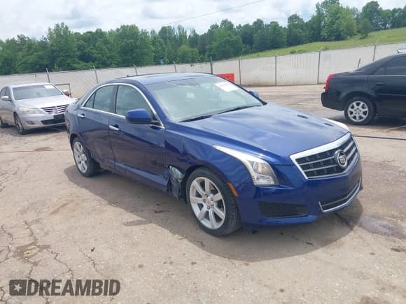 ✅ 2014 Cadillac ATS Standard RWD • VIN: 1G6AA5RA5E0159374 • Lot: 42225945. Listed on IAAI with 72,692 mi. Free auction sales archive from the USA and detailed vehicle history report at DreamBid. Image 1.