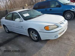 ✅ 2001 Pontiac Grand Am GT • VIN: 1G2NW52EX1C147666 • Лот: 41689955. Опубликован ранее на IAAI с пробегом 189 598 миль. Бесплатный доступ к архиву аукционных продаж из США и подробный отчёт об истории автомобиля на DreamBid. Изображение 1.