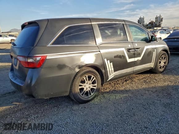 ✅ 2011 Honda Odyssey EX-L • VIN: 5FNRL5H63BB051288 • Lot: 94717645. Listed on Copart with 299,482 mi. Free auction sales archive from the USA and detailed vehicle history report at DreamBid. Image 3.