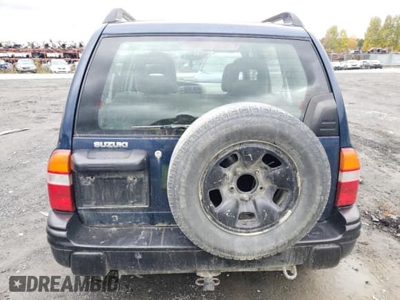 ✅ 2004 Suzuki Vitara • VIN: 2S3TD62VX46100019 • Lot: 74291684. Wystawiony na Copart z przebiegiem 148 566 mil. Bezpłatny archiwum sprzedaży aukcyjnych z USA i szczegółowy raport historii pojazdu na DreamBid. Zdjęcie 6.