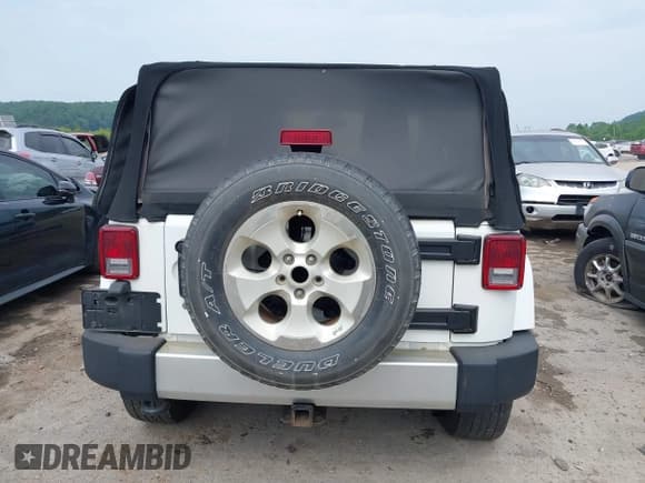 ✅ 2013 Jeep Wrangler Sahara • VIN: 1C4AJWBG5DL507768 • Лот: 42426900. Опубликован ранее на IAAI с пробегом 132 511 миль. Бесплатный доступ к архиву аукционных продаж из США и подробный отчёт об истории автомобиля на DreamBid. Изображение 16.
