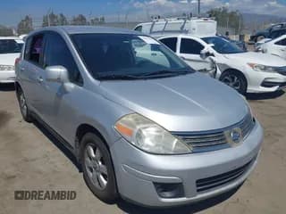 ✅ 2007 Nissan Versa S • VIN: 3N1BC13EX7L410415 • Lot: 43097089. Listed on IAAI with 132,079 mi. Free auction sales archive from the USA and detailed vehicle history report at DreamBid. Image 1.