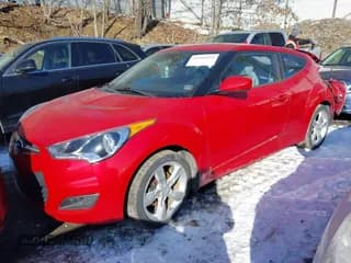 ✅ 2013 Hyundai Veloster w/Black Int • VIN: KMHTC6AD9DU093541 • Lot: 41585034. Wystawiony na IAAI z przebiegiem 66 883 mil. Bezpłatny archiwum sprzedaży aukcyjnych z USA i szczegółowy raport historii pojazdu na DreamBid. Zdjęcie 2.