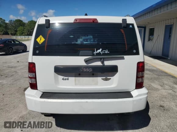 ✅ 2012 Jeep Liberty Sport • VIN: 1C4PJLAK8CW161131 • Lot: 82438025. Listed on Copart with 144,706 mi. Free auction sales archive from the USA and detailed vehicle history report at DreamBid. Image 6.