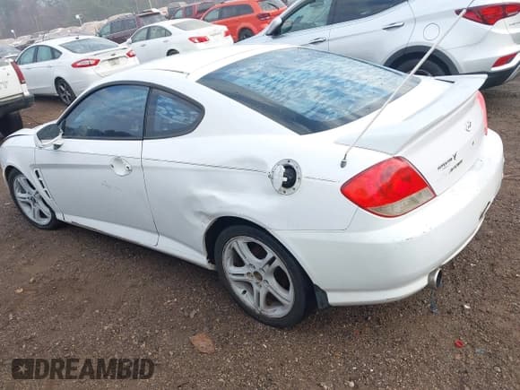 ✅ 2006 Hyundai Tiburon GT • VIN: KMHHN65F76U209611 • Лот: 43699777. Опубликован ранее на IAAI с пробегом 475 239 миль. Бесплатный доступ к архиву аукционных продаж из США и подробный отчёт об истории автомобиля на DreamBid. Изображение 3.
