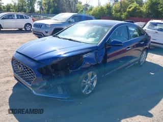 2019 Hyundai Sonata SEL z VIN 5NPE34AF1KH809701, wystawiony jako IAAI lot #43330696 z przebiegiem 76 660 mil mil oraz . Historia ofert i sprzedaży dostępna na DreamBid. Obrazek 2.
