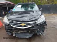 ✅ 2016 Chevrolet Traverse LT • VIN: 1GNKRGKD8GJ289275 • Lot: 43423221. Listed on IAAI with 136,907 mi. Free auction sales archive from the USA and detailed vehicle history report at DreamBid. Image 12.