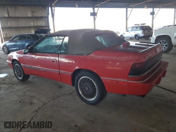 ✅ 1990 Chrysler LeBaron • VIN: 1C3XJ45J9LG405682 • Lot: 48690985. Wystawiony na Copart z przebiegiem 75 714 mil. Bezpłatny archiwum sprzedaży aukcyjnych z USA i szczegółowy raport historii pojazdu na DreamBid. Zdjęcie 2.