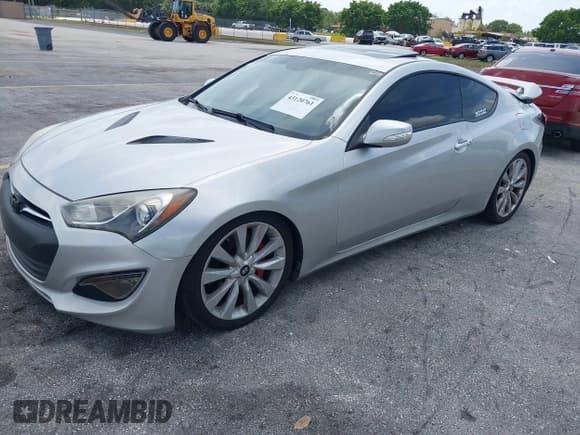 ✅ 2013 Hyundai Genesis Coupe Grand Touring • VIN: KMHHU6KJ6DU091110 • Lot: 43120761. Wystawiony na IAAI z przebiegiem 92 096 mil. Bezpłatny archiwum sprzedaży aukcyjnych z USA i szczegółowy raport historii pojazdu na DreamBid. Zdjęcie 2.
