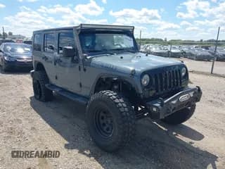 ✅ 2015 Jeep Wrangler Unlimited Sport • VIN: 1C4BJWDG1FL662600 • Lot: 43076009. Wystawiony na IAAI z przebiegiem 156 918 mil. Bezpłatny archiwum sprzedaży aukcyjnych z USA i szczegółowy raport historii pojazdu na DreamBid. Zdjęcie 1.